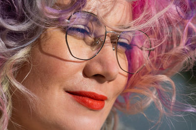 Close-up of woman wearing eyeglasses