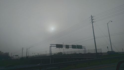 View of road against cloudy sky