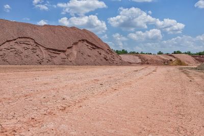 Open-pit mine against sky