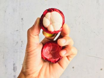 Midsection of woman holding ice cream