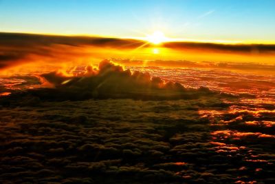 Scenic view of landscape against sky during sunset