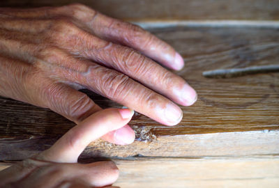 Cropped image of man working on table