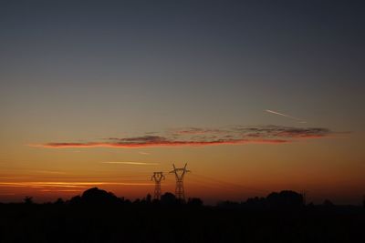 Scenic view of silhouette landscape against sky during sunset