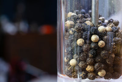 Close-up of eggs in glass jar on table