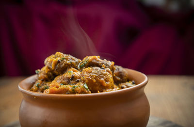 Close-up of noodles in bowl on table