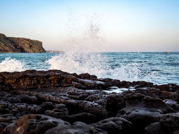 Scenic view of sea against clear sky