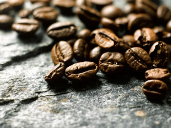 Close-up of coffee beans on table