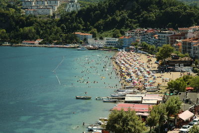 High angle view of harbor by buildings in city