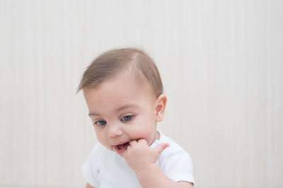 Portrait of cute boy looking away