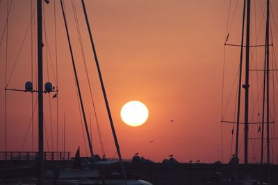 Scenic view of sea against orange sky