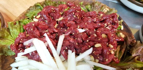 High angle view of chopped vegetables on table