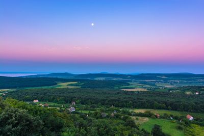 Scenic view of landscape against sky during sunset