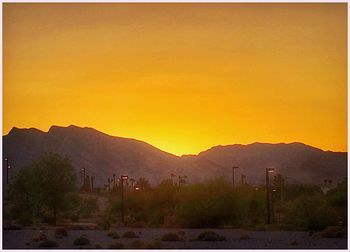 Scenic view of mountains at sunset