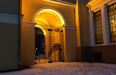 Entrance of building covered with snow