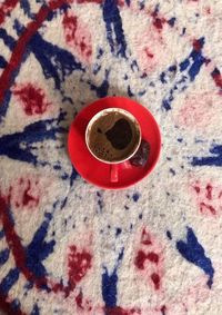 Directly above shot of coffee cup on table