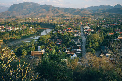 High angle view of townscape and mountains