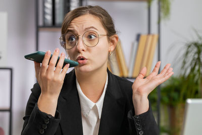 Young woman using mobile phone