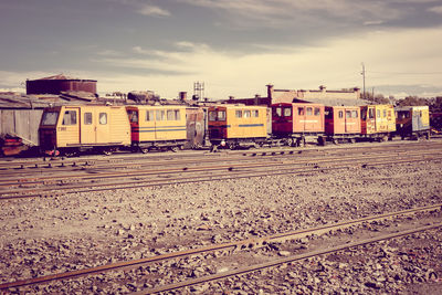 Train on railroad track against sky