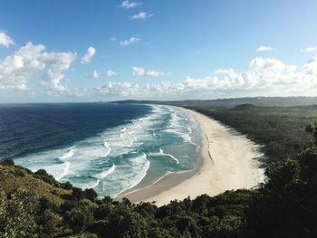 Scenic view of sea against cloudy sky