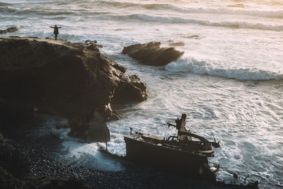 High angle view of shipwreck at beach