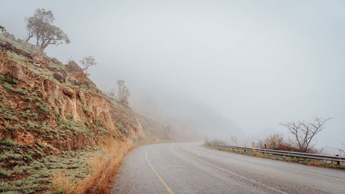 Misty mountainous road on the way to kaapsehoop, south africa.