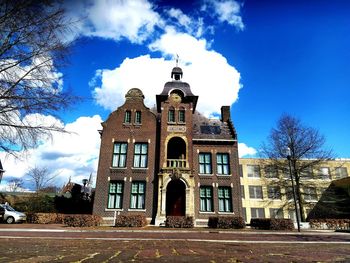 Facade of historic building against sky