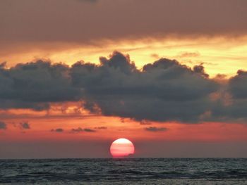 Scenic view of sea at sunset