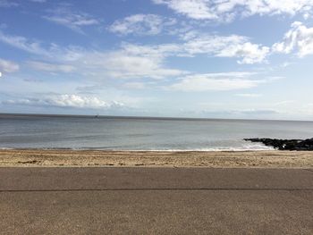 Scenic view of beach against sky