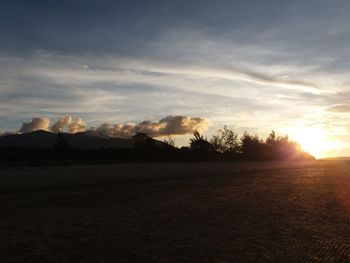 Scenic view of sunset over landscape