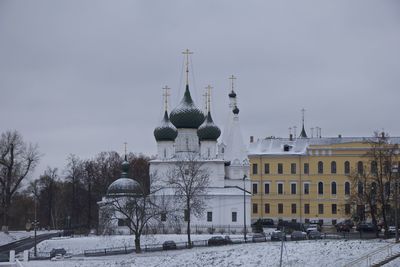 Buildings in city during winter