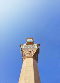 Low angle view of building against blue sky