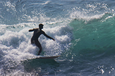 Man surfing in sea