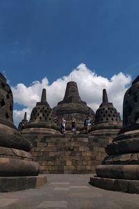 View of temple against cloudy sky