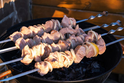 Close-up of meat on barbecue grill