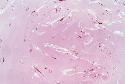 Full frame shot of wet pink paint