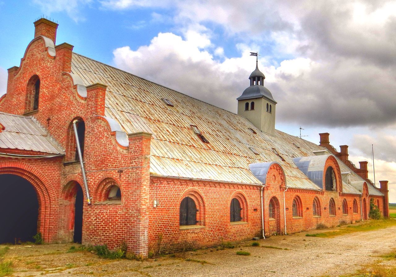 architecture, built structure, building exterior, sky, cloud - sky, place of worship, cloudy, religion, cloud, low angle view, spirituality, history, arch, church, day, outdoors, facade, no people, dome