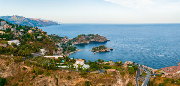 Panoramic aerial view of isola bella island and beach in taormina.