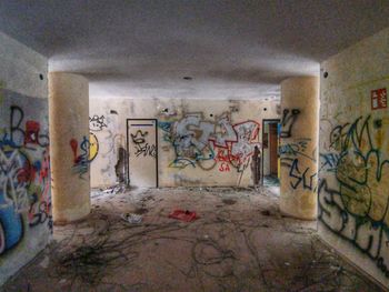 Graffiti on wall in abandoned building