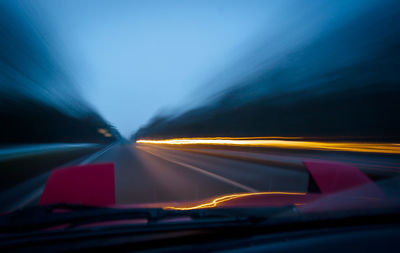 Road seen through car windshield