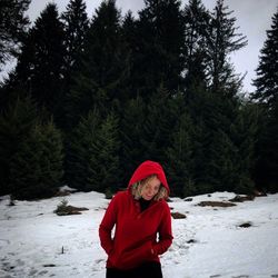 Man standing on snow covered land