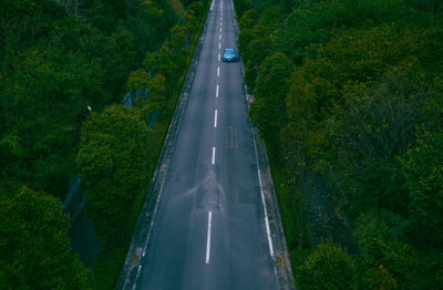 High angle view of road amidst trees