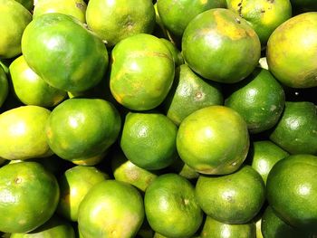 Full frame shot of limes for sale in market