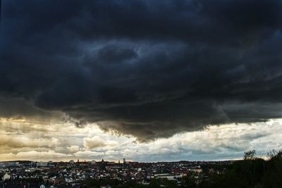 Storm clouds over city