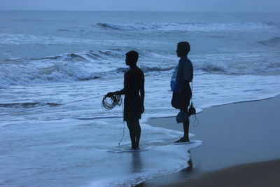 Fisher man on beach