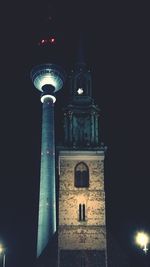 View of illuminated tower at night