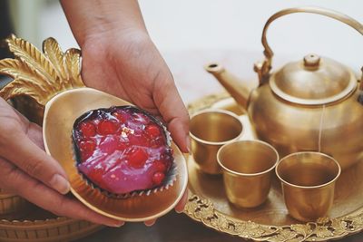 Midsection of woman holding food