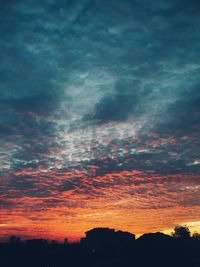 Low angle view of cloudy sky during sunset