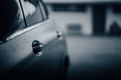 Close-up of wet car