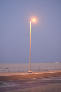 Street light against clear sky