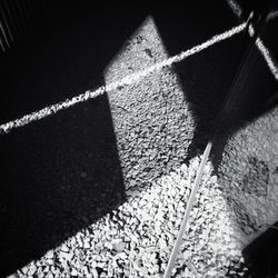 High angle view of shadow on floor
